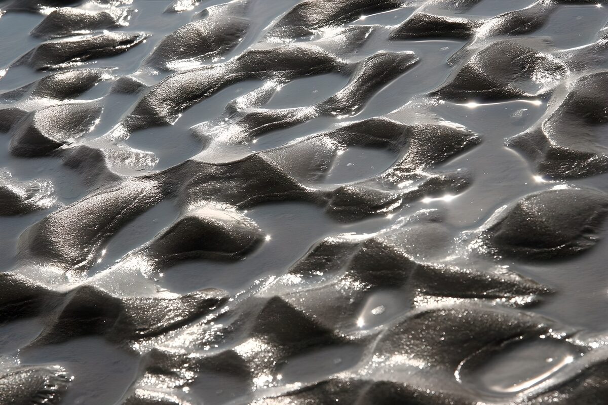 Glanzend zand in de zon