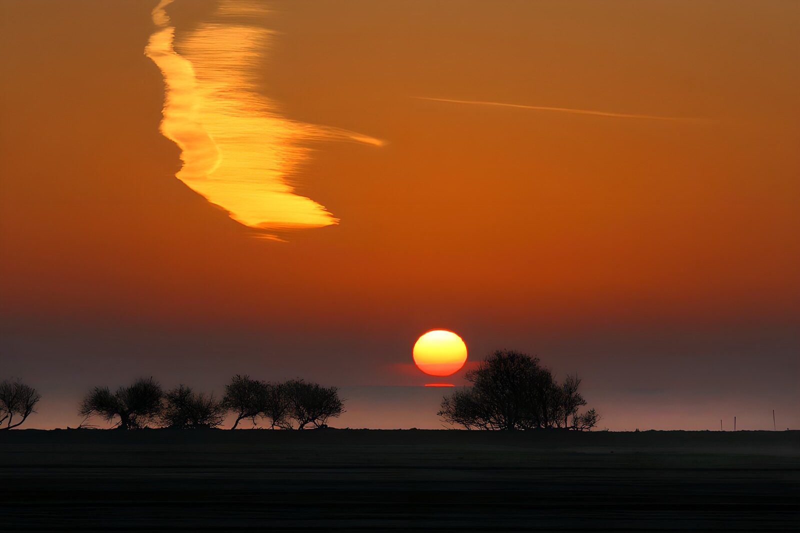 CW5517256: Zonsondergang boven het water