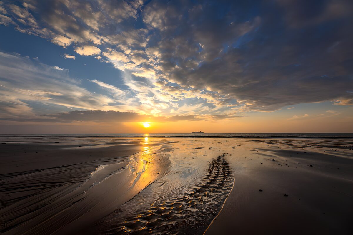 Zonsondergang aan het strand