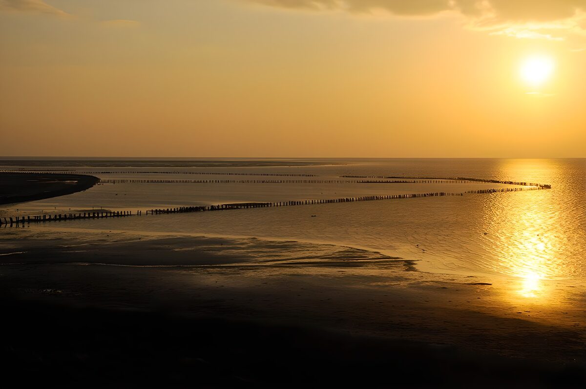 Zonsopgang boven het water