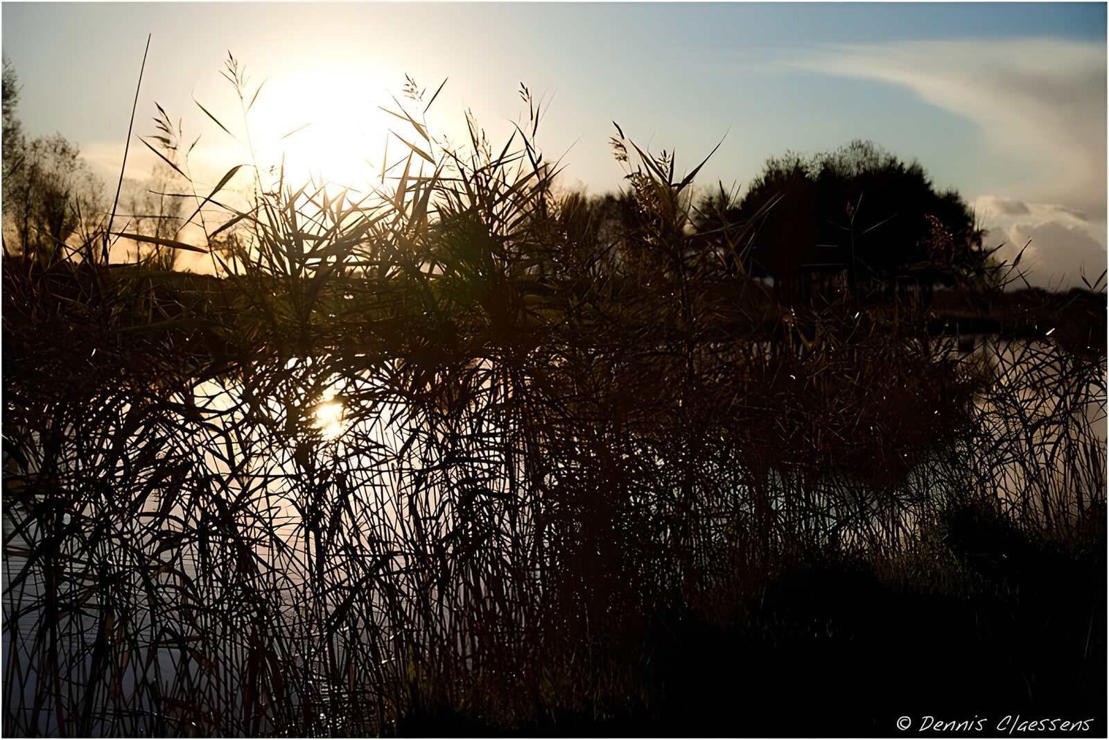 CW5387811: Zonsondergang bij het water